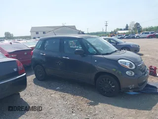 2014 FIAT 500L Pop z VIN ZFBCFAAHXEZ016833, wystawiony jako IAAI lot #42161735 z przebiegiem 137 580 mil mil oraz . Historia ofert i sprzedaży dostępna na DreamBid. Obrazek 13.