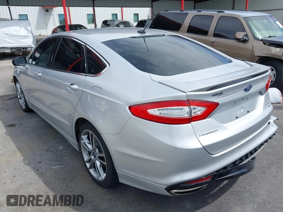 2016 Ford Fusion Titanium with VIN 3FA6P0K90GR132709, listed as a IAAI auction lot 41790873 with 63,269 mi miles and . Bid and sale history available at carsss.com. Image 3.