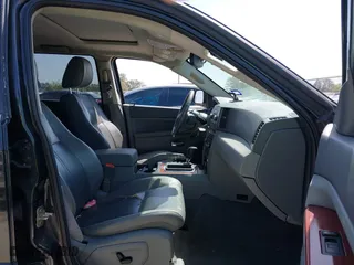 2005 Jeep Grand Cherokee Limited with VIN 1J4HS58N95C657759, listed as a IAAI auction lot 41830601 with 184,393 mi miles. Bid and sale history available at carsss.com. Image 5.