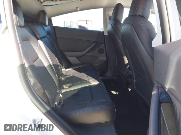 2022 Tesla Model Y Long Range with VIN 7SAYGDEE1NF402745, listed as a IAAI auction lot 41493850 with 11,222 mi miles and . Bid and sale history available at DreamBid. Image 8.