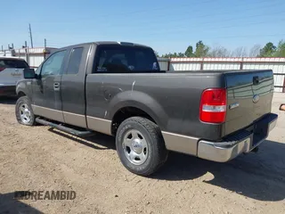 2005 Ford F-150 XLT with VIN 1FTPX12585NA67903, listed as a IAAI auction lot 41856821 with 174,847 mi miles. Bid and sale history available at carsss.com. Image 3.
