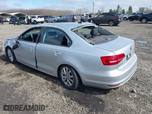2015 Volkswagen Jetta Sedan 1.8T SE with VIN 3VWD17AJ3FM297573, listed as a IAAI auction lot 41884541 with 98,225 mi miles. Bid and sale history available at carsss.com. Image 3.