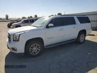 2017 GMC Yukon XL SLT z VIN 1GKS2GKCXHR150258, wystawiony jako Copart lot #55797605 z przebiegiem Nie podano mil oraz Szkoda całkowita • Salvage title. Historia ofert i sprzedaży dostępna na DreamBid. Obrazek 1.