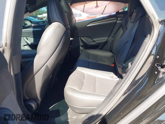 2023 Tesla Model S Plaid with VIN 5YJSA1E67PF528171, listed as a IAAI auction lot 41831086 with Not provided miles and . Bid and sale history available at DreamBid. Image 8.