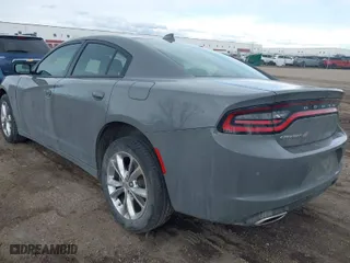 2023 Dodge Charger SXT with VIN 2C3CDXJG1PH632408, listed as a IAAI auction lot 42006263 with 24,295 mi miles. Bid and sale history available at carsss.com. Image 3.