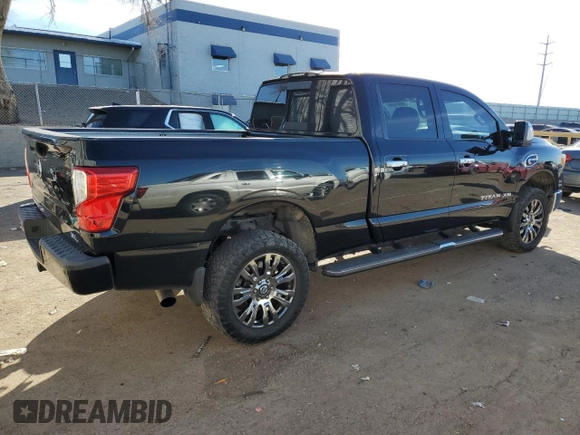 2017 Nissan Titan SL z VIN 1N6BA1F20HN522403, wystawiony jako Copart lot #87477114 z przebiegiem 98 084 mil mil oraz Szkoda całkowita • Salvage title. Historia ofert i sprzedaży dostępna na DreamBid. Obrazek 3.