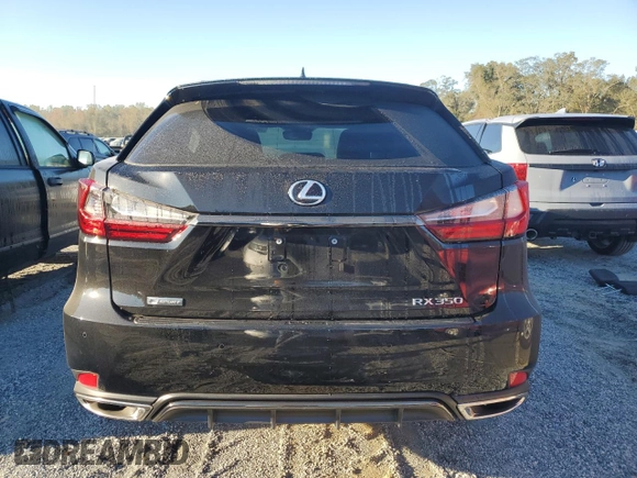 2021 Lexus RX with VIN 2T2YZMDA6MC302127, listed as a Copart auction lot 76701064 with 16,725 mi miles and Salvage Title. Bid and sale history available at carsss.com. Image 6.