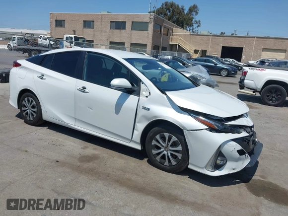 2021 Toyota Prius LE z VIN JTDKAMFP3M3187644, wystawiony jako IAAI lot #42443171 z przebiegiem 126 977 mil mil oraz . Historia ofert i sprzedaży dostępna na DreamBid. Obrazek 1.