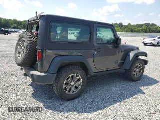2017 Jeep Wrangler Rubicon with VIN 1C4BJWCG0HL675472, listed as a Copart auction lot 62751365 with 86,338 mi miles and Salvage title. Bid and sale history available at DreamBid. Image 3.