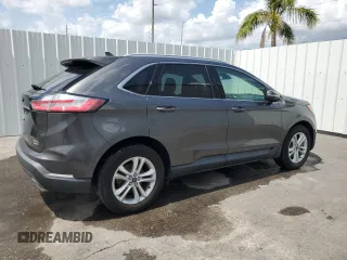 2020 Ford Edge SEL с VIN 2FMPK4J95LBB17293, выставлен на аукционе Copart как лот 58796255 с пробегом 82 583 миль миль и Чистый • Clean title. История ставок и продаж доступна на DreamBid. Изображение 3.