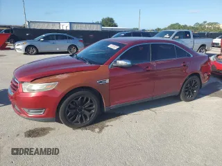 2015 Ford Taurus Limited with VIN 1FAHP2F87FG100870, listed as a Copart auction lot 65283605 with 212,635 mi miles and Clean title. Bid and sale history available at DreamBid. Image 1.