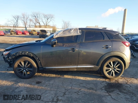 2016 Mazda CX-3 Grand Touring with VIN JM1DKBD74G0115936, listed as a IAAI auction lot 41296104 with 191,408 mi miles. Bid and sale history available at carsss.com. Image 14.