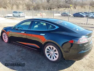 2016 Tesla Model S 90D with VIN 5YJSA1E22GF174301, listed as a IAAI auction lot 38867108 with 60,715 mi miles and . Bid and sale history available at DreamBid. Image 3.
