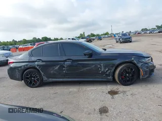 2021 BMW 5 Series 540i with VIN WBA53BJ03MCG98664, listed as a IAAI auction lot 42488708 with 64,101 mi miles and . Bid and sale history available at DreamBid. Image 12.