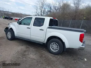 2018 Nissan Frontier PRO-4X with VIN 1N6AD0EV1JN701905, listed as a IAAI auction lot 41863044 with NaN miles. Bid and sale history available at carsss.com. Image 3.