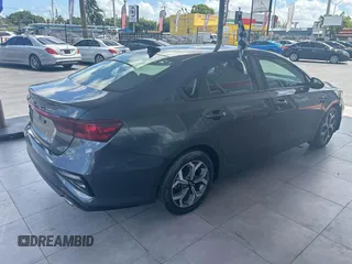 2021 Kia Forte LXS with VIN 3KPF24AD6ME337864, listed as a IAAI auction lot 42472943 with 81,961 mi miles and . Bid and sale history available at DreamBid. Image 4.
