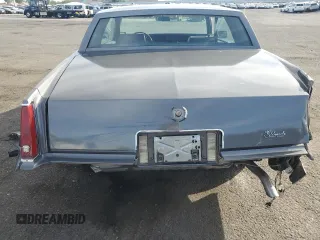 1985 Cadillac Eldorado z VIN 1G6EL5786FE628861, wystawiony jako Copart lot #76372384 z przebiegiem 15 146 mil mil oraz Szkody całkowita. Historia ofert i sprzedaży dostępna na DreamBid. Obrazek 6.