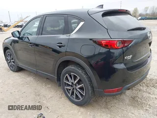 2018 Mazda CX-5 Grand Touring with VIN JM3KFBDM3J0384431, listed as a IAAI auction lot 42013474 with 65,018 mi miles. Bid and sale history available at carsss.com. Image 3.