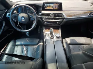 2020 BMW 5 Series M550i xDrive with VIN WBAJS7C06LCD12779, listed as a Copart auction lot 61136215 with 81,286 mi miles and Salvage title. Bid and sale history available at DreamBid. Image 8.