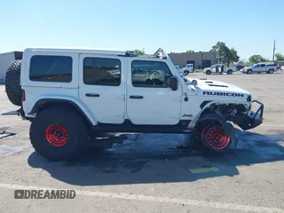 2018 Jeep Wrangler Unlimited Rubicon with VIN 1C4HJXFGXJW110629, listed as a IAAI auction lot 42141572 with 65,973 mi miles and . Bid and sale history available at DreamBid. Image 13.