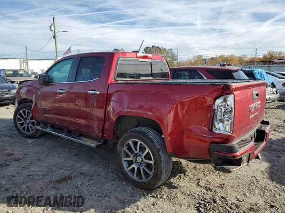 2021 GMC Canyon 2WD Denali with VIN 1GTG5EEN7M1254810, listed as a Copart auction lot 84808244 with 32,726 mi miles and Salvage Title. Bid and sale history available at carsss.com. Image 2.