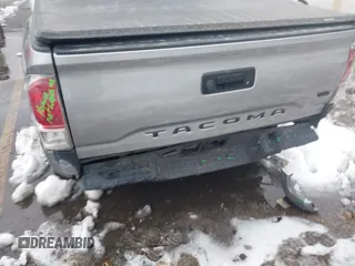 2021 Toyota Tacoma SR z VIN 3TMCZ5AN0MM386867, wystawiony jako IAAI lot #41580426 z przebiegiem 46 559 mil mil oraz . Historia ofert i sprzedaży dostępna na DreamBid. Obrazek 6.