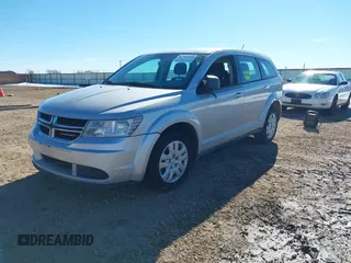2014 Dodge Journey American Value Pkg with VIN 3C4PDCAB5ET119192, listed as a IAAI auction lot 41344250 with 228,461 mi miles. Bid and sale history available at carsss.com. Image 2.