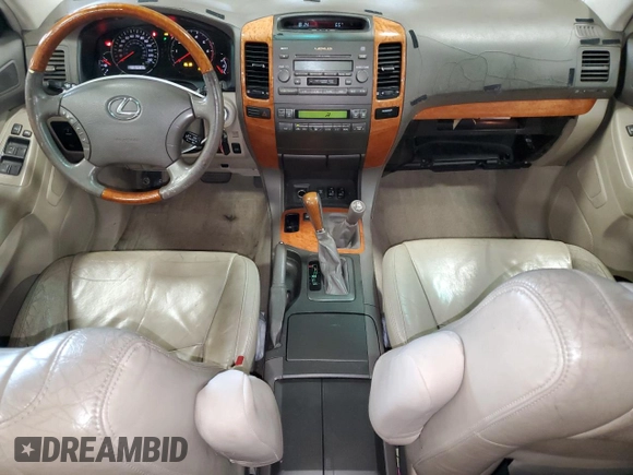 2004 Lexus GX 470 with VIN JTJBT20X740025411, listed as a Copart auction lot 55363145 with 329,164 mi miles and Salvage Title. Bid and sale history available at DreamBid. Image 8.