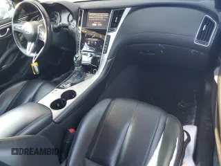 2017 Infiniti Q60 Premium with VIN JN1CV7EL9HM320869, listed as a Copart auction lot 84380414 with 99,797 mi miles and Salvage title. Bid and sale history available at DreamBid. Image 8.
