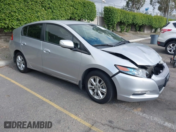 2010 Honda Insight EX with VIN JHMZE2H75AS003695, listed as a IAAI auction lot 42119429 with 90,901 mi miles and . Bid and sale history available at DreamBid. Image 1.