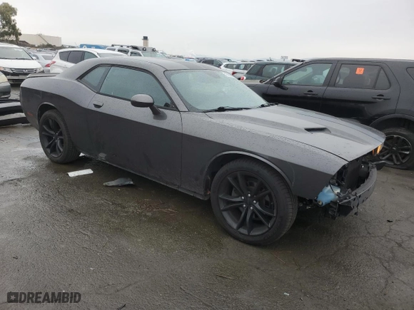 2016 Dodge Challenger SXT Plus with VIN 2C3CDZAG8GH232079, listed as a Copart auction lot 43621585 with 106,824 mi miles and Salvage Title. Bid and sale history available at carsss.com. Image 4.
