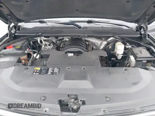 2015 Chevrolet Suburban LT z VIN 1GNSKJKC9FR245097, wystawiony jako IAAI lot #42468168 z przebiegiem 198 454 mil mil oraz . Historia ofert i sprzedaży dostępna na DreamBid. Obrazek 10.