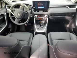 2024 Toyota RAV4 Hybrid XLE Premium with VIN JTMB6RFV4RD137902, listed as a Copart auction lot 86013364 with 9,330 mi miles and Salvage Title. Bid and sale history available at DreamBid. Image 8.