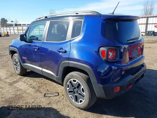 2017 Jeep Renegade Trailhawk z VIN ZACCJBCB5HPE96860, wystawiony jako IAAI lot #41734370 z przebiegiem 113 405 mil mil oraz . Historia ofert i sprzedaży dostępna na DreamBid. Obrazek 3.