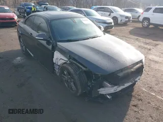 2016 BMW 2 Series M235i xDrive z VIN WBA1J9C55GV696183, wystawiony jako IAAI lot #41608002 z przebiegiem 91 269 mil mil oraz . Historia ofert i sprzedaży dostępna na DreamBid. Obrazek 1.