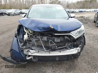 2019 Honda CR-V EX with VIN 2HKRW2H54KH630921, listed as a IAAI auction lot 41366277 with 103,075 mi miles and . Bid and sale history available at DreamBid. Image 6.