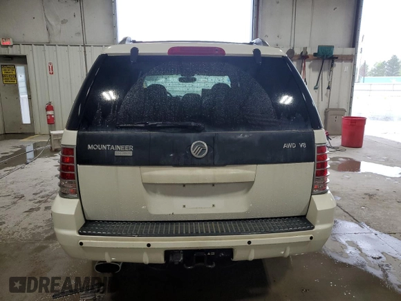 2004 Mercury Mountaineer Convenience z VIN 4M2DU86W04ZJ06749, wystawiony jako Copart lot #55472605 z przebiegiem 122 596 mil mil oraz Szkoda całkowita • Salvage title. Historia ofert i sprzedaży dostępna na DreamBid. Obrazek 6.