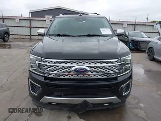 2019 Ford Expedition Platinum with VIN 1FMJU1MT8KEA02325, listed as a IAAI auction lot 41861772 with 77,124 mi miles. Bid and sale history available at carsss.com. Image 13.