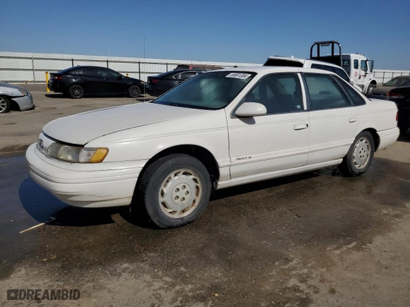 1994 Ford Taurus GL with VIN 1FALP52U7RG261559, listed as a Copart auction lot 55681304 with 28,675 mi miles and Salvage Title. Bid and sale history available at carsss.com. Image 1.