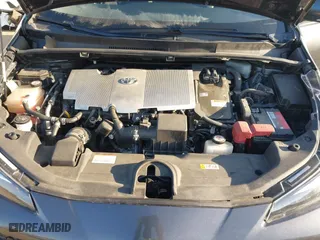 2020 Toyota Prius L Eco with VIN JTDKARFUXL3117737, listed as a IAAI auction lot 41988550 with 64,865 mi miles. Bid and sale history available at carsss.com. Image 10.