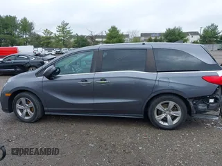 2018 Honda Odyssey EX-L z VIN 5FNRL6H70JB025227, wystawiony jako IAAI lot #41940992 z przebiegiem 95 797 mil mil oraz . Historia ofert i sprzedaży dostępna na DreamBid. Obrazek 14.