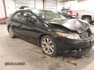 2012 Honda Civic Si z VIN 2HGFB6E5XCH702453, wystawiony jako IAAI lot #42612108 z przebiegiem 106 752 mil mil oraz . Historia ofert i sprzedaży dostępna na DreamBid. Obrazek 1.