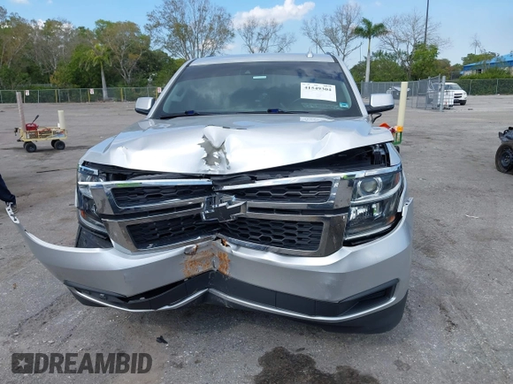 2018 Chevrolet Tahoe LT with VIN 1GNSCBKCXJR367852, listed as a IAAI auction lot 41549304 with 151,684 mi miles and . Bid and sale history available at DreamBid. Image 13.