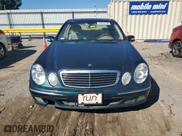 2003 Mercedes-Benz E-Class 3.2L with VIN WDBUF65J53A101021, listed as a Copart auction lot 73015774 with 242,812 mi miles and Clean Title. Bid and sale history available at carsss.com. Image 5.