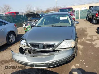 2003 Mercury Sable GS z VIN 1MEFM50243A619761, wystawiony jako IAAI lot #41790150 z przebiegiem 114 522 mil mil oraz . Historia ofert i sprzedaży dostępna na DreamBid. Obrazek 12.