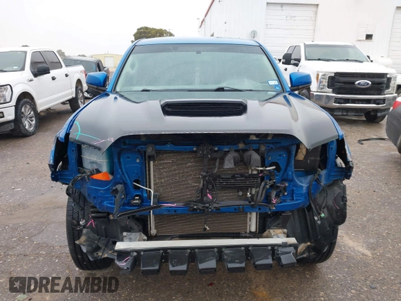 2016 Toyota Tacoma SR with VIN 5TFCZ5AN4GX013233, listed as a IAAI auction lot 41394610 with 142,099 mi miles and . Bid and sale history available at DreamBid. Image 12.