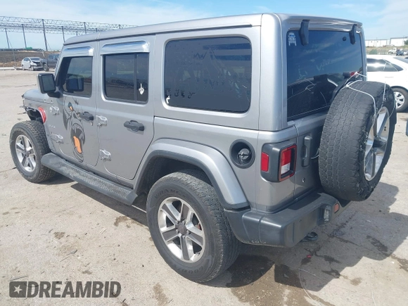 2018 Jeep Wrangler Unlimited Sahara with VIN 1C4HJXEG4JW115522, listed as a IAAI auction lot 42322791 with 68,409 mi miles and . Bid and sale history available at DreamBid. Image 3.
