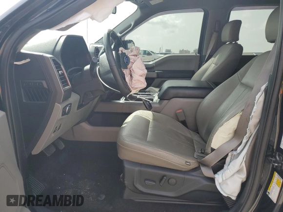 2019 Ford F-150 XL with VIN 1FTEW1C56KKE02968, listed as a Copart auction lot 62542595 with 93,422 mi miles and Salvage title. Bid and sale history available at DreamBid. Image 7.