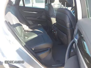 2018 BMW X6 xDrive35i with VIN 5UXKU2C50J0X51275, listed as a IAAI auction lot 41421704 with 165,052 mi miles. Bid and sale history available at carsss.com. Image 8.