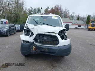 2016 Ford Transit Cargo with VIN 1FTYR1ZM0GKA39870, listed as a IAAI auction lot 42209469 with 142,214 mi miles and . Bid and sale history available at DreamBid. Image 12.